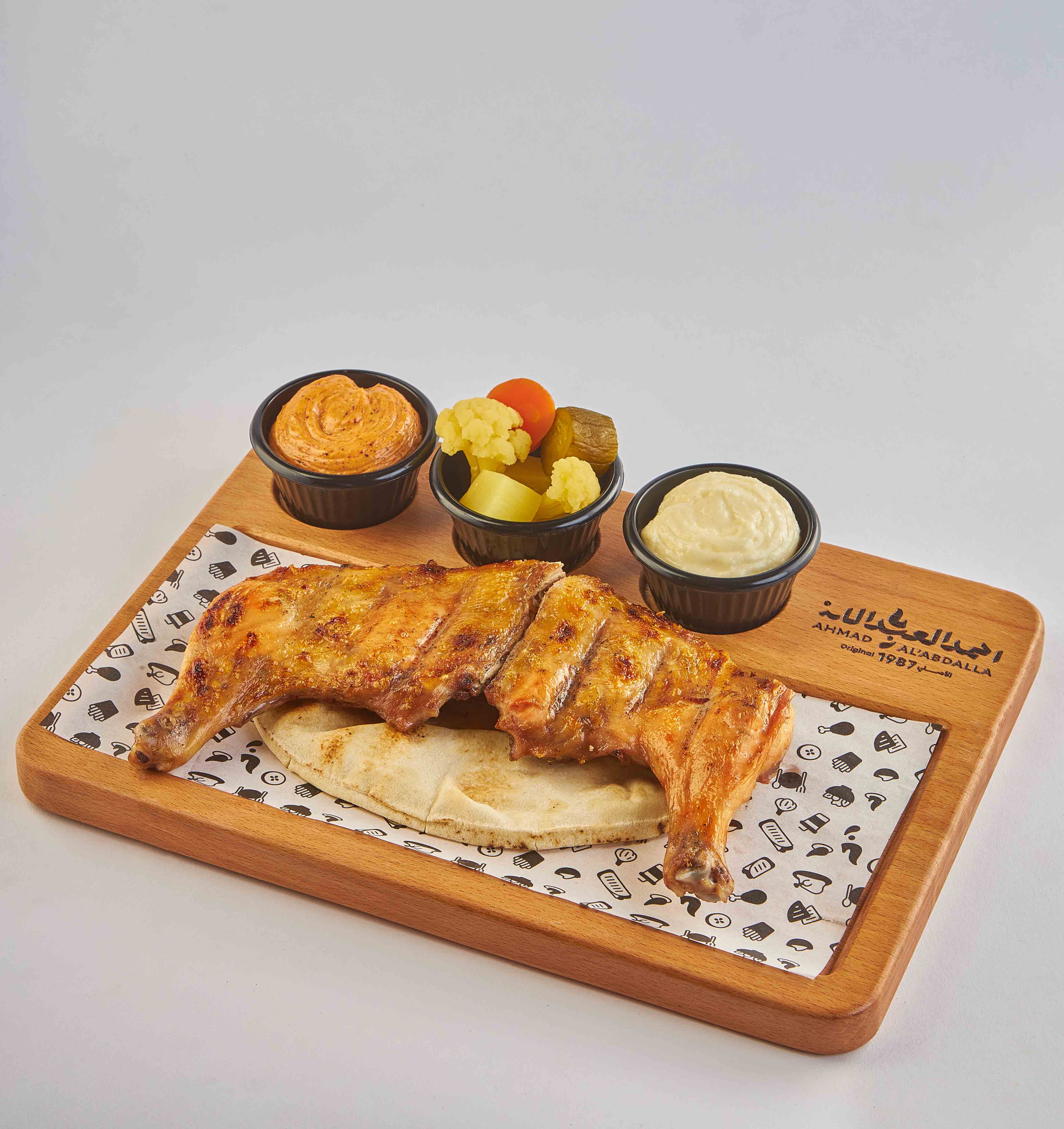 نص فروج أوراك مشوي على الفحم