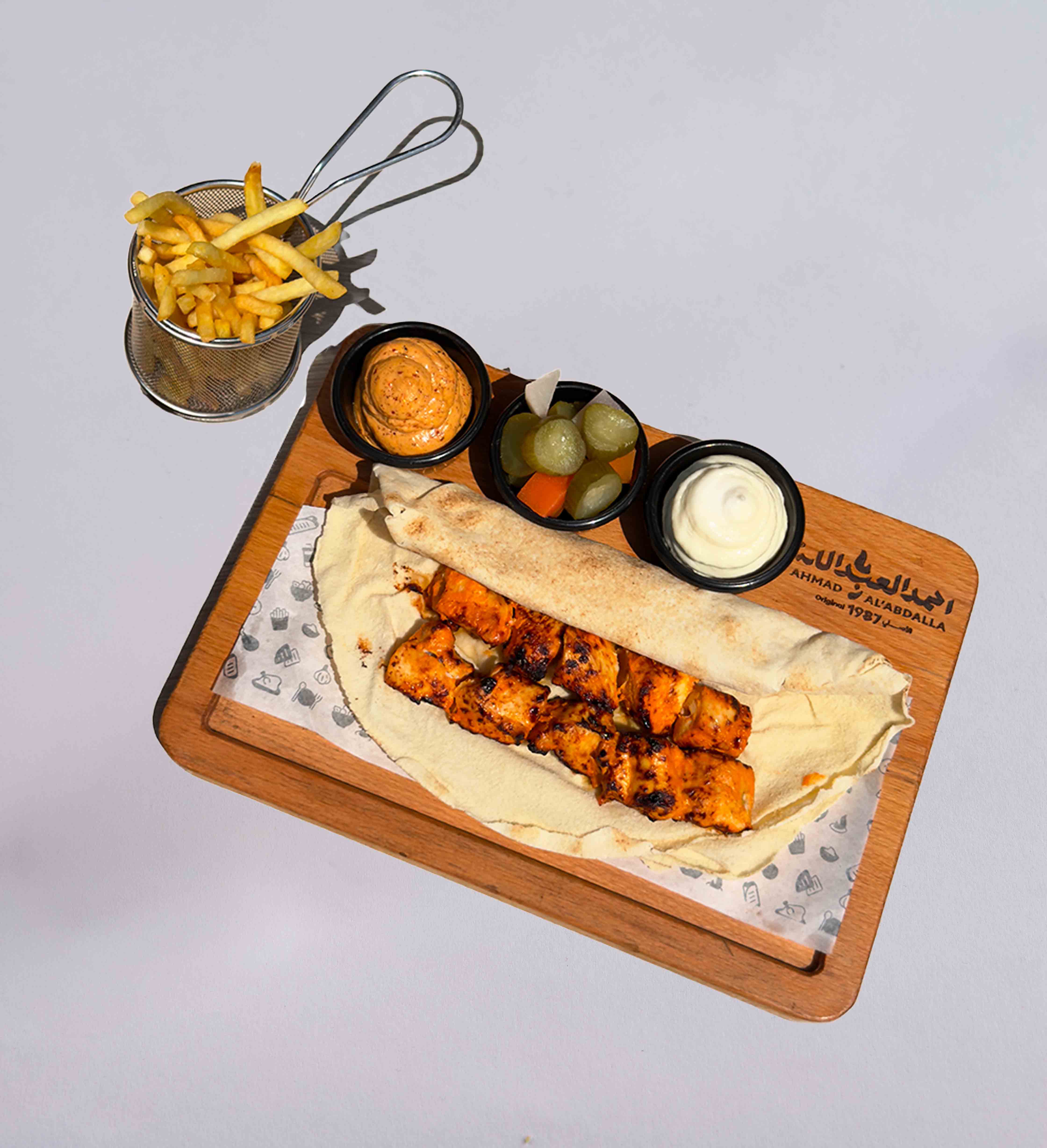وجبة شيش طاووق مع بطاطا